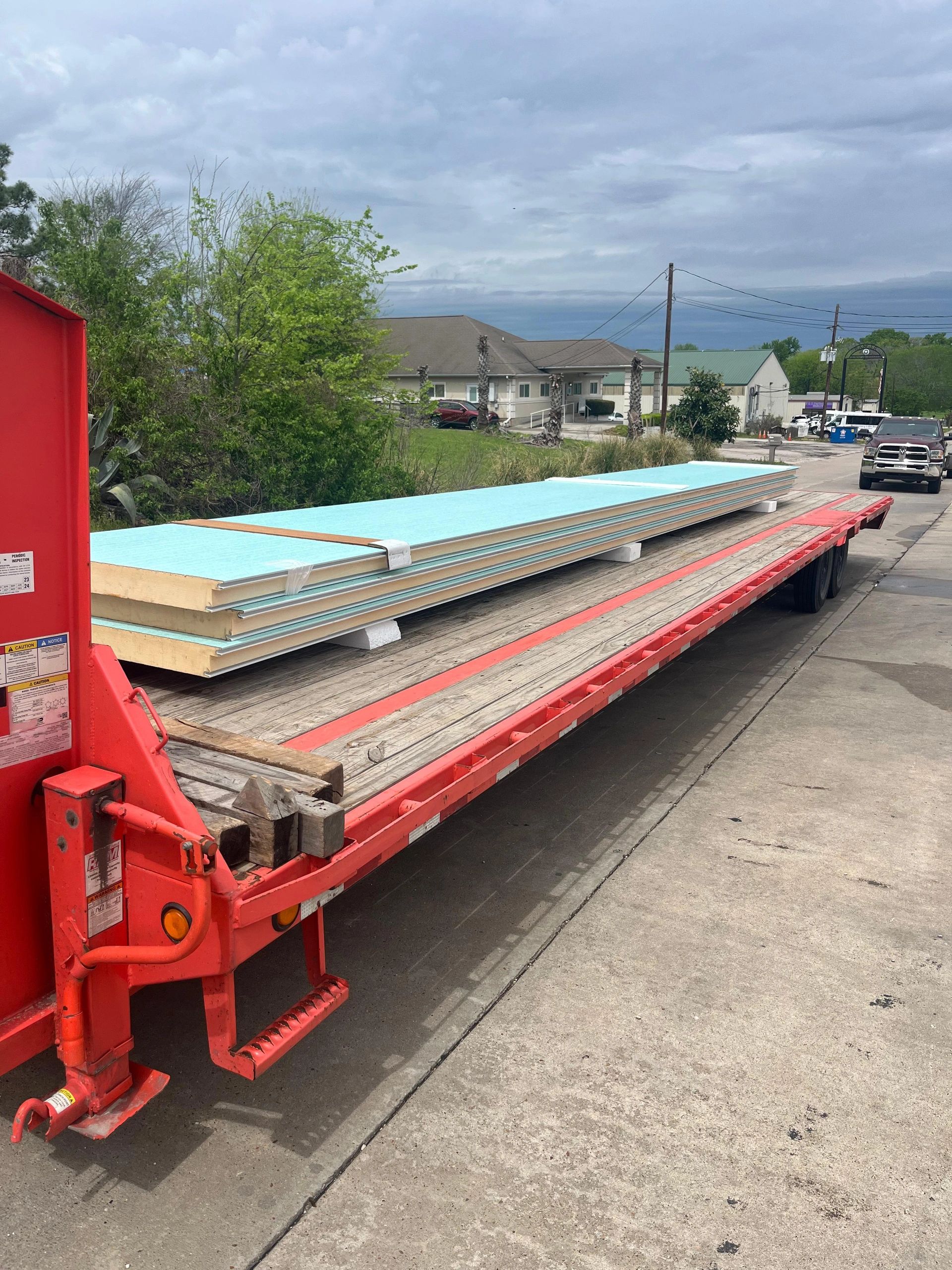 Insulation panels flatbed trailer residential street
